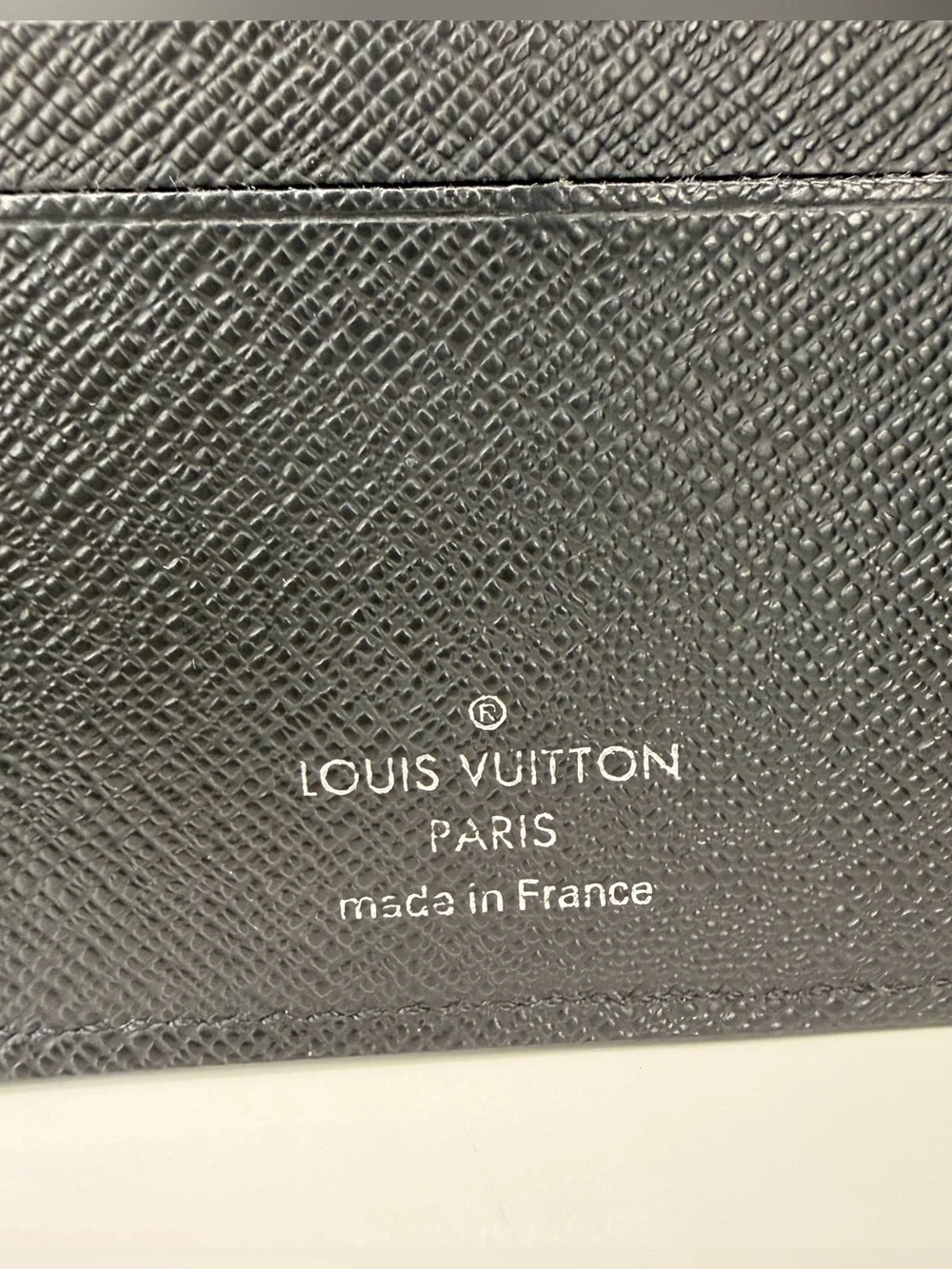 Authentic Louis Vuitton Black Epi Leather Bi-Fold Wallet